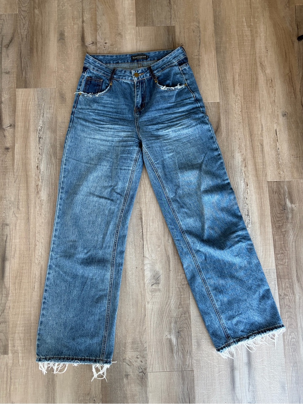 Distressed Light Blue Relaxed Denim Jeans
